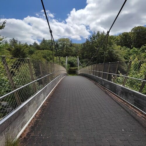 Suspension bridge over motorway on walk from Bodmin to Lanhydrock