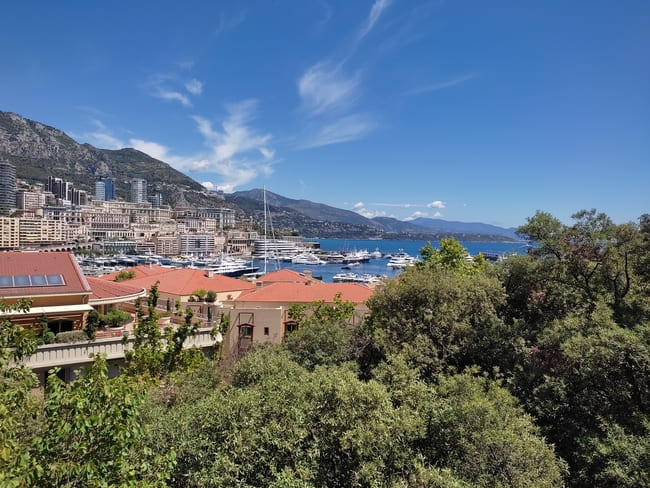 View of Monaco with highrise buildings, harbour and sea
