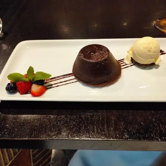 Chocolate Cake with fruits and ice cream