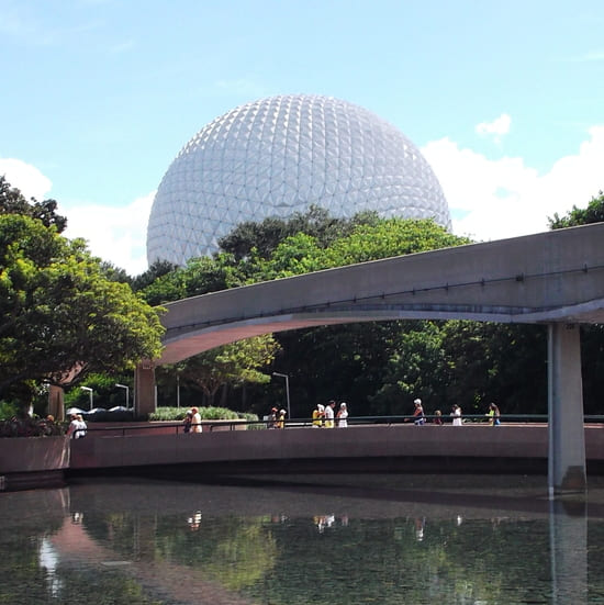 Big golf-ball shaped Spaceship Earth at Epcot Center with tracks of Monorail