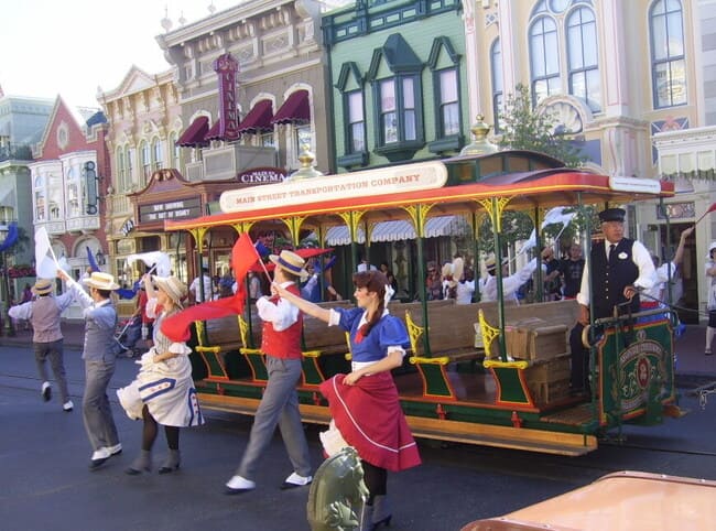 Streetcar on Main Street USA with singers/dancers