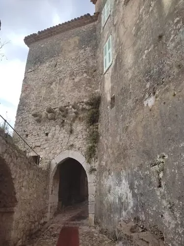 The stone gate invites you into Eze Village