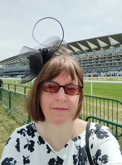 Photo of author Kitty with fascinator