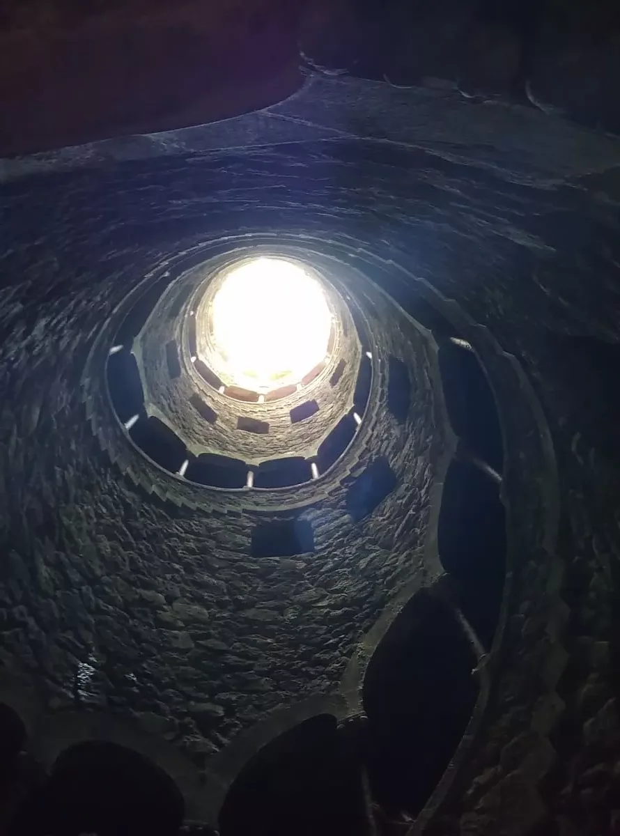Looking up inside the initiation well at Quinta da Regaleira the bright day light seems far away. A definite highlight in Sintra!
