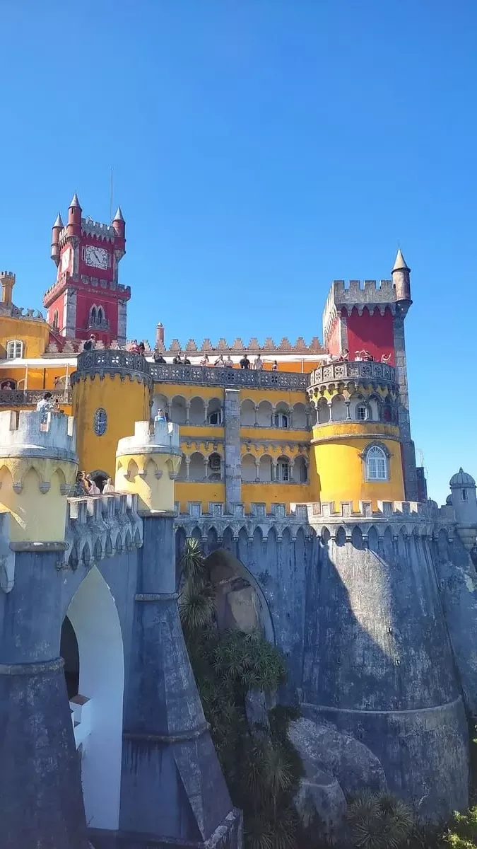 The red clock tower and bright yellow main castle perching on a grey base on the hillside seem to be taken straight out of a fairy tale book. Pena Palace is probably the most important sight in Sintra but it will also require the most planning.