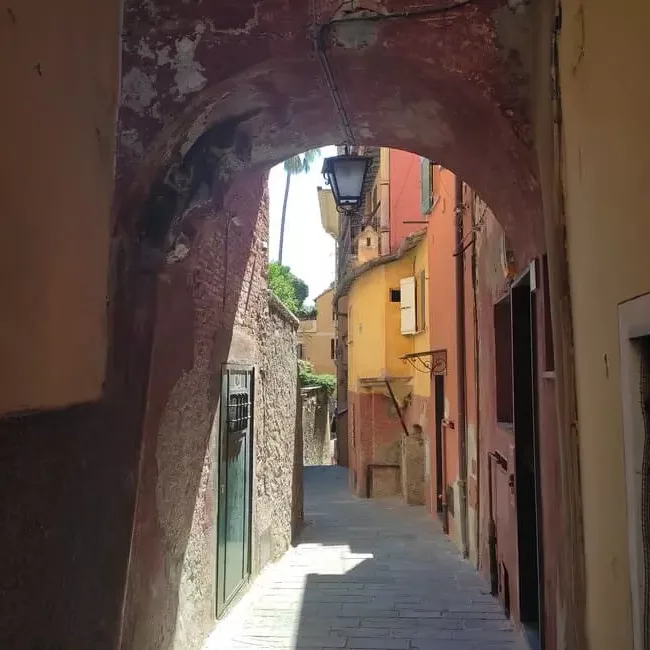 Small street between old, quaint buildings in Portofino. If you try you can escape the tourist masses and find a quiet side street to soak up the atmosphere.