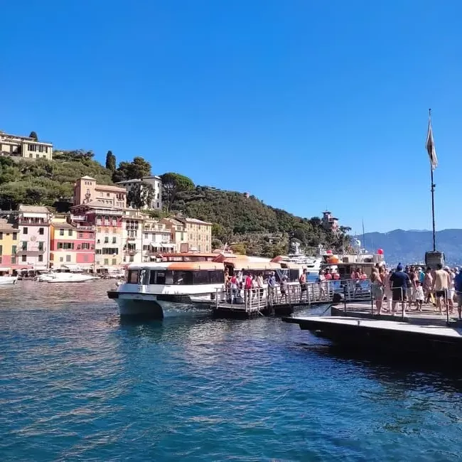 Tender boat at dock in Portofino, close to town center.