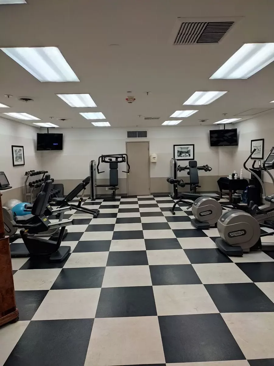 The small fitness room on Queen Mary is a recreation of the original room with modern machines. The most distinctive feature is the large chess board pattern on the floor