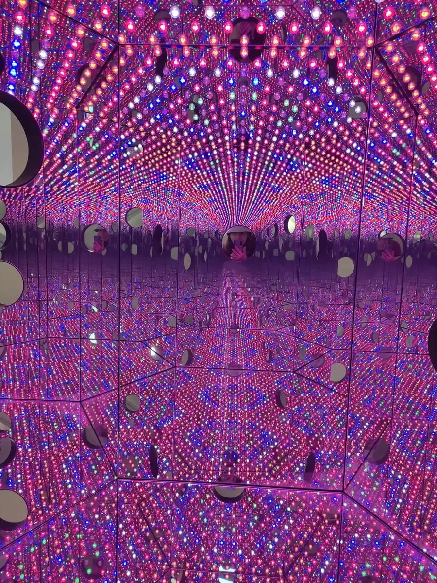 Purple, blue and pink make up the colors of Kusama's Longing for Eternity at this moment
