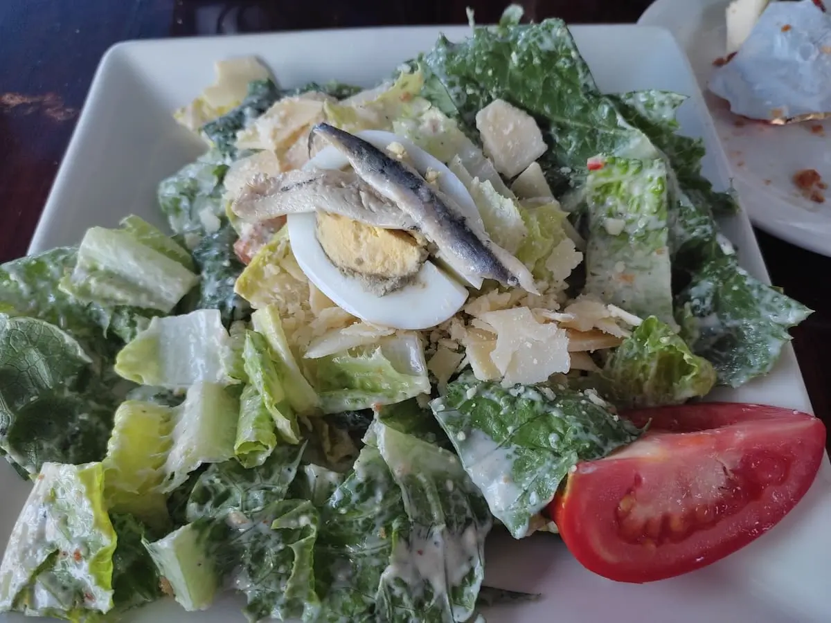 Ceasar Salad with boiled egg, parmesan, and anchovies