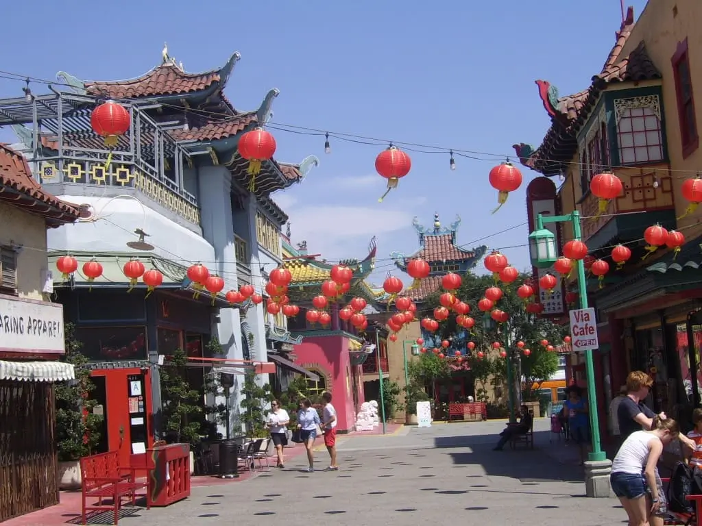 Street in LA's Chinatown with cute stores in pagoda-style and red lampoons