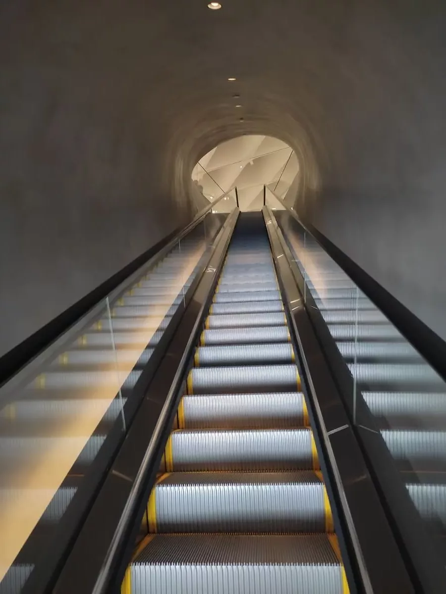 The escalator at the Broad Museum leads through a narrow tunnel