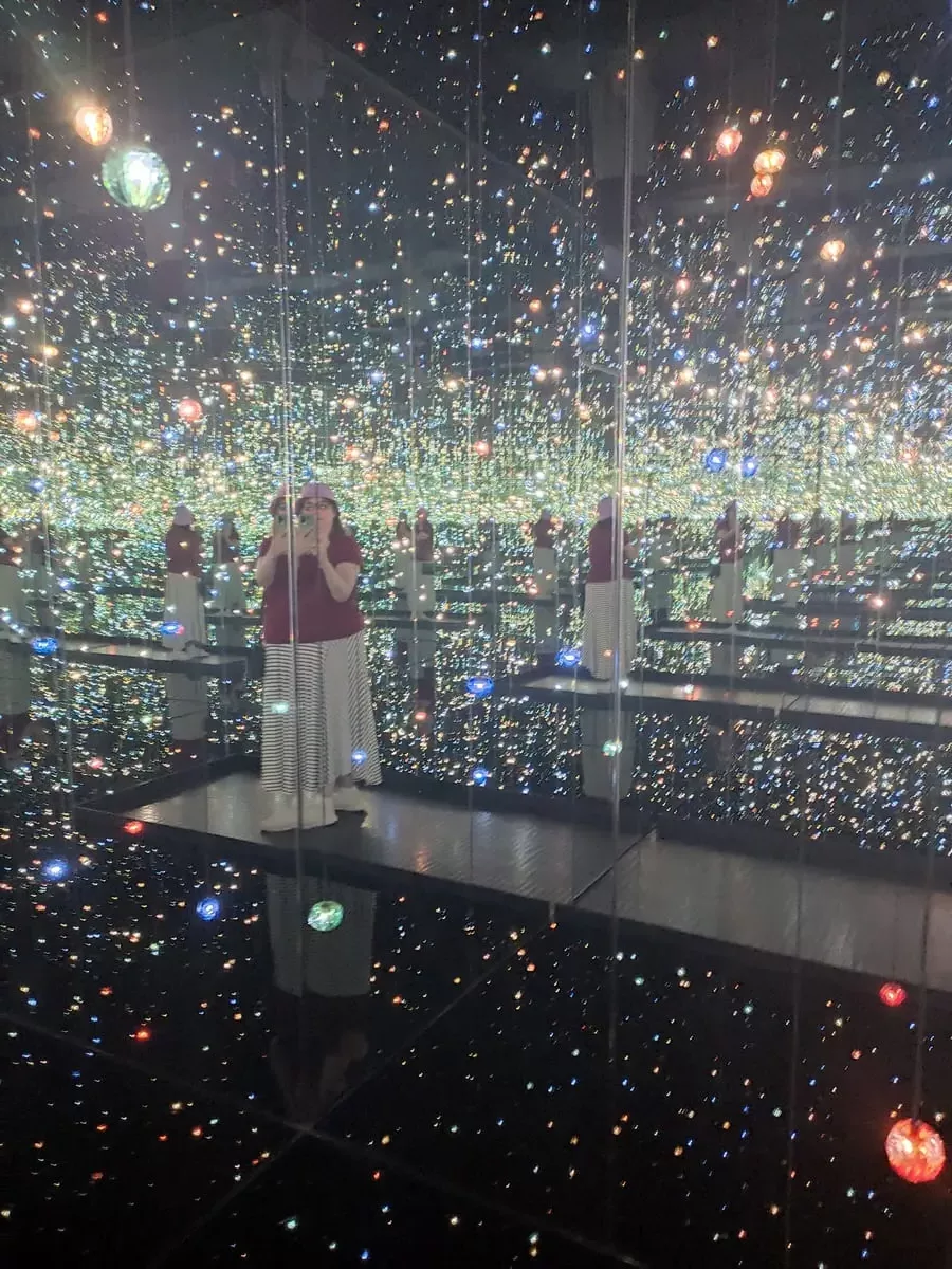 Inside the Broad Museum's exhibit: Infinity Mirrored Room - The Souls of Millions of Light Years Away