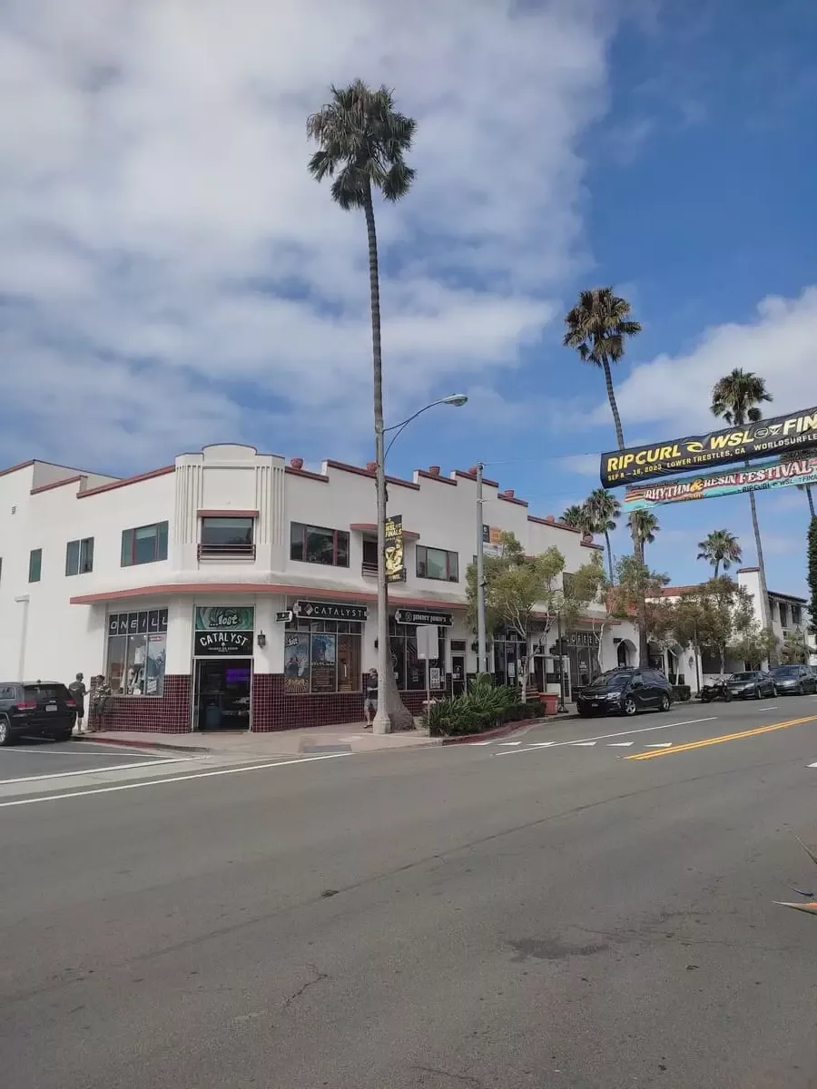 San Clemente's main street is filled with low-rise white buildings with red roofs and palm trees