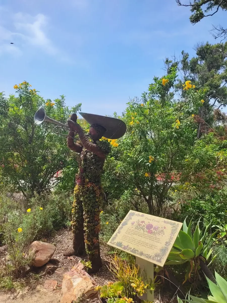 Figure of a Mexican Mariachi player formed out of flowers at the Mexican Garden in Encinitas