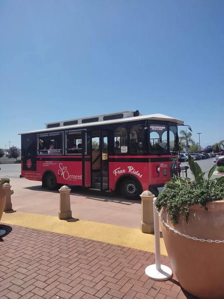The free San Clemente Trolley is waiting for passengers at the San Clemente Outlet Center