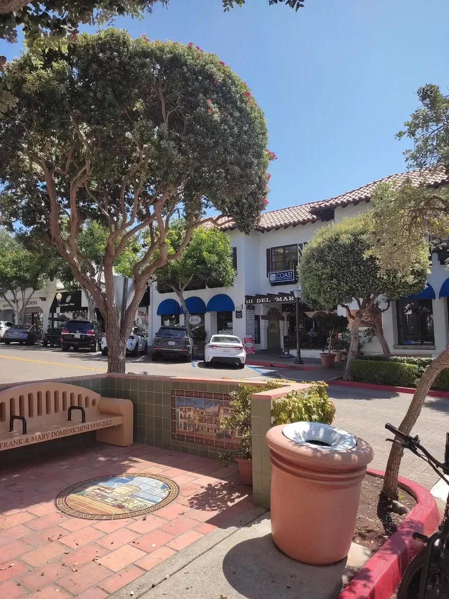 Avenida del Mar in San Clemente is lined by white buildings with red roofs and shady trees