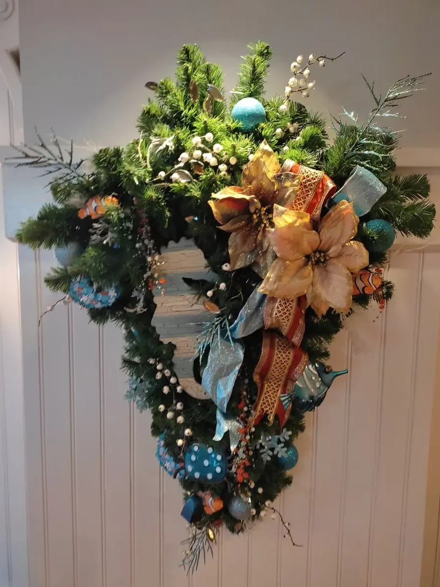 Christmas wreath with seahorse, Nemo figure, mistletoe, and bows