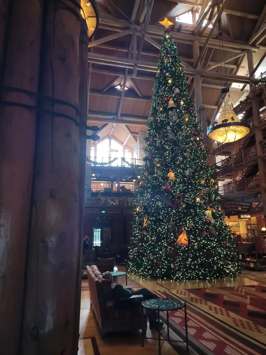 Lobby of Disney's Wilderness Lodge with huge Christmas Tree