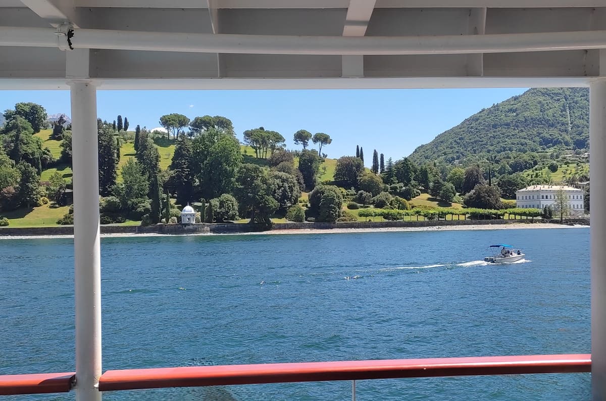 Gardens of Villa Melzi seen from boat on Lake Como