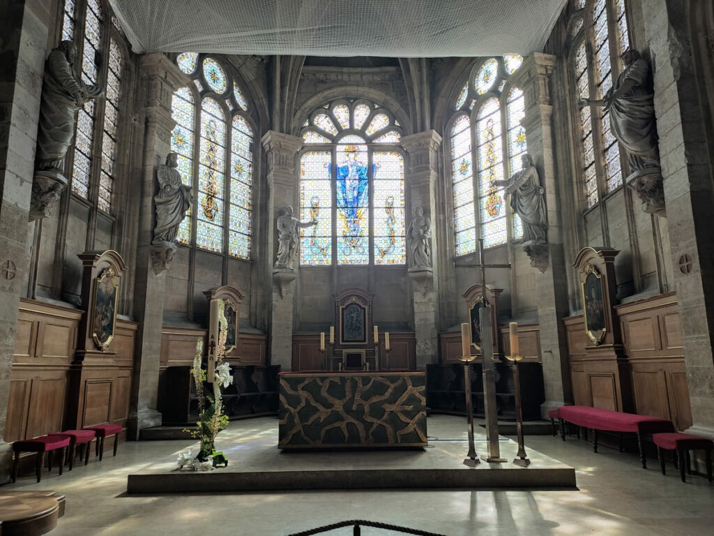 Interior of Church Notre-Dame in Le Havre with statues and stained glass windows