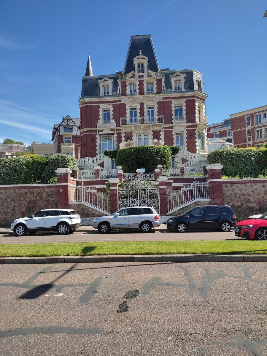 Brick mansion with white trim in Le Havre