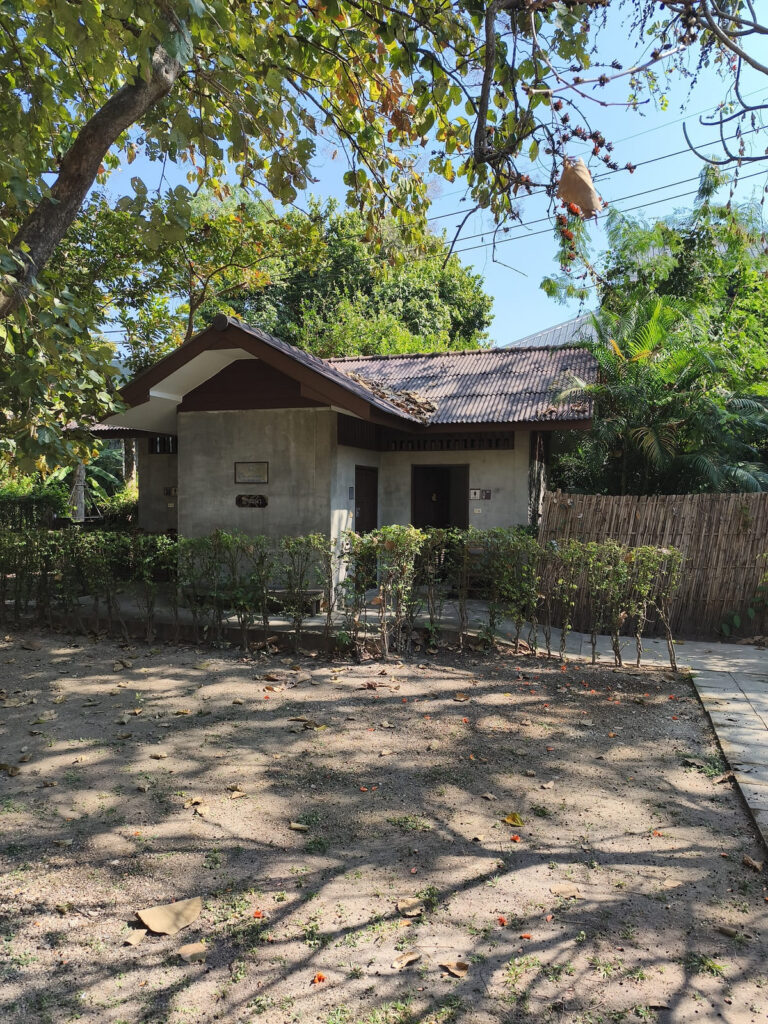 Small hut with restrooms at museum