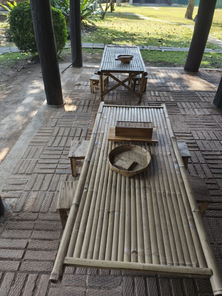 Two low wooden tables with chairs and games