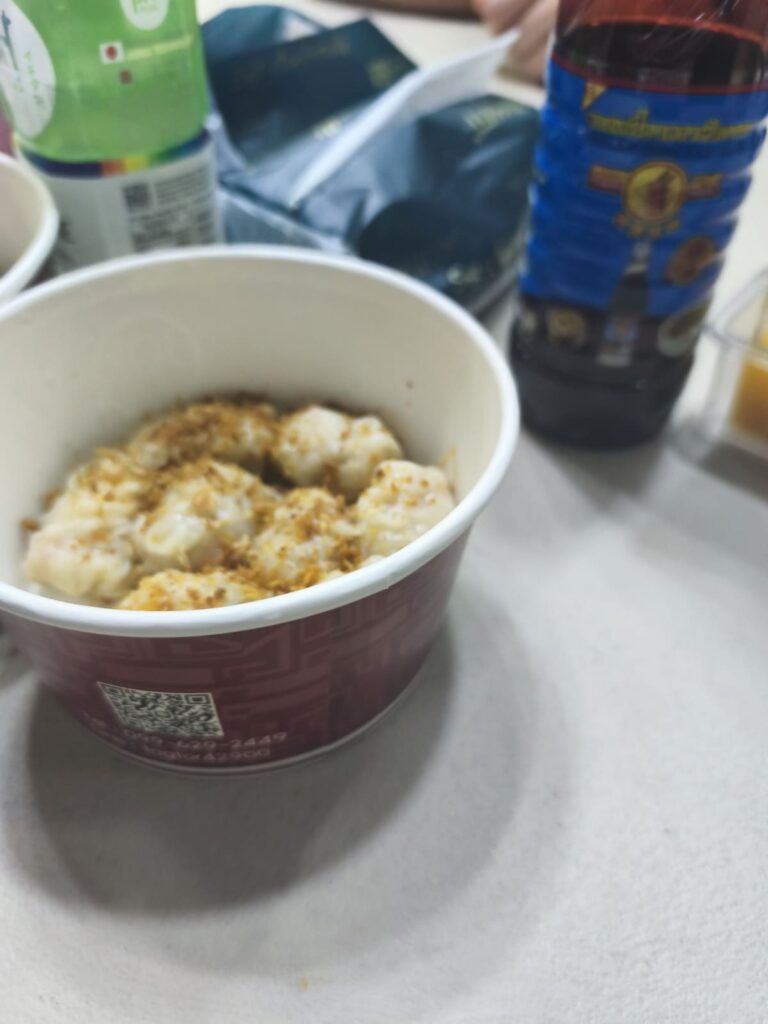 Round container with shrimp dumplings