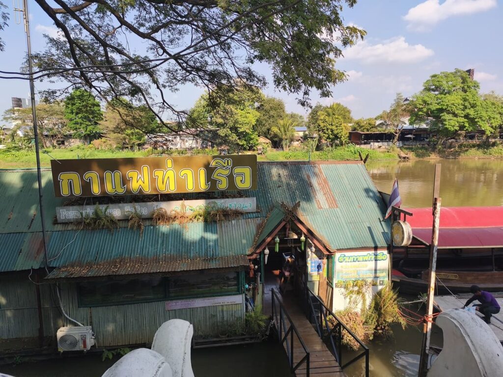 Docked boat with café and check-in for cruise