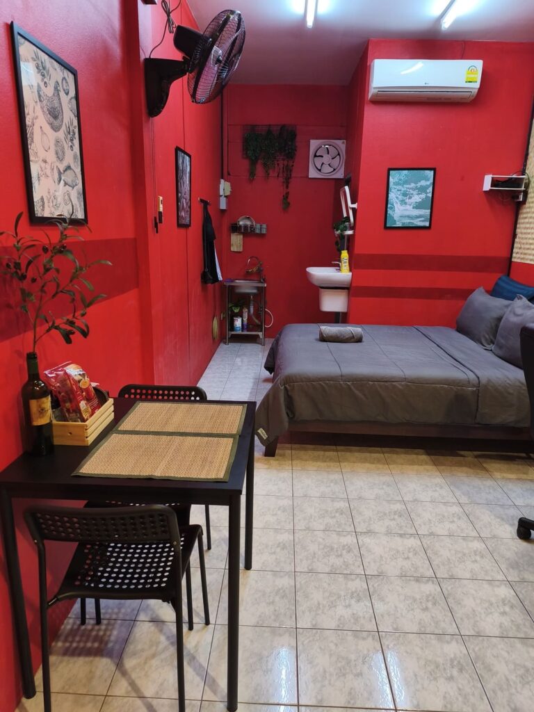 My apartment in Chiang Mai with bed and small table