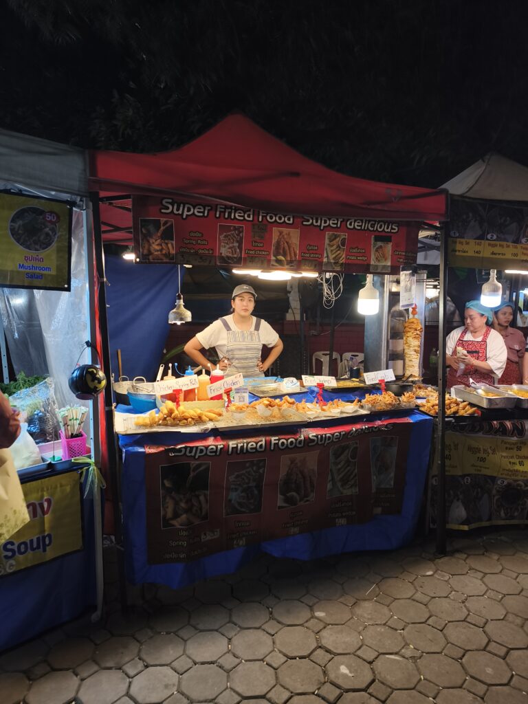 Night market stall with fried foods