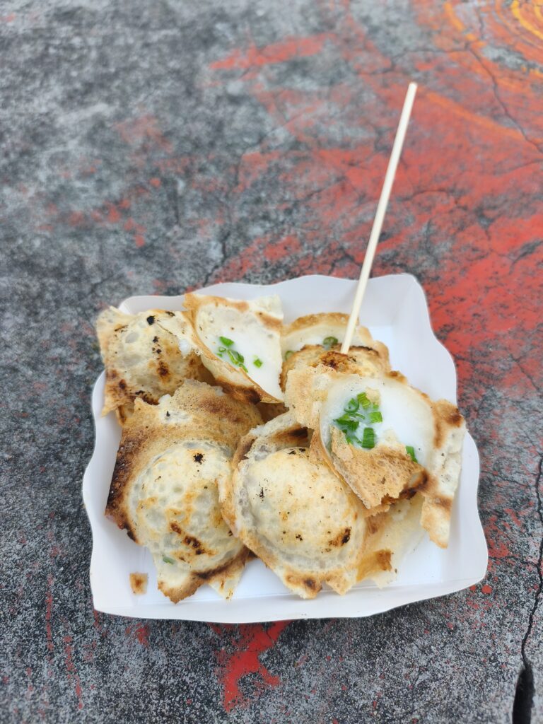 Small pile of coconut pancakes with scallions
