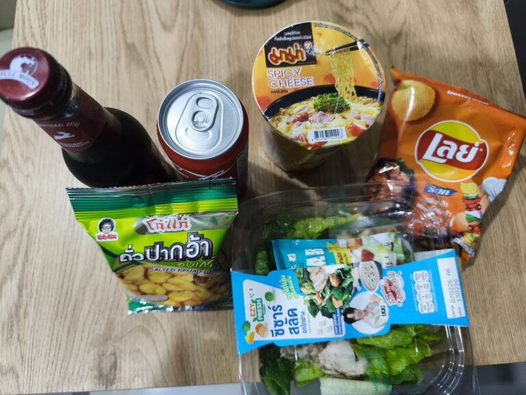 Snacks, salad, soda, and wine cooler