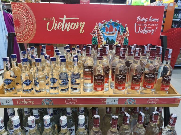 Shelf with vodka and price labels