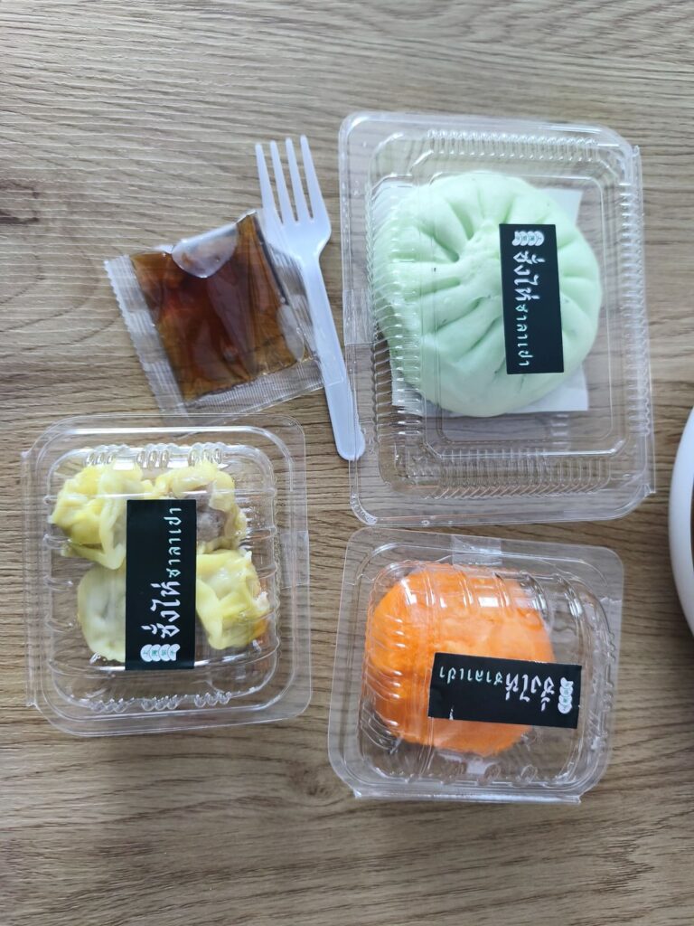 Plastic containers with Chinese dumplings