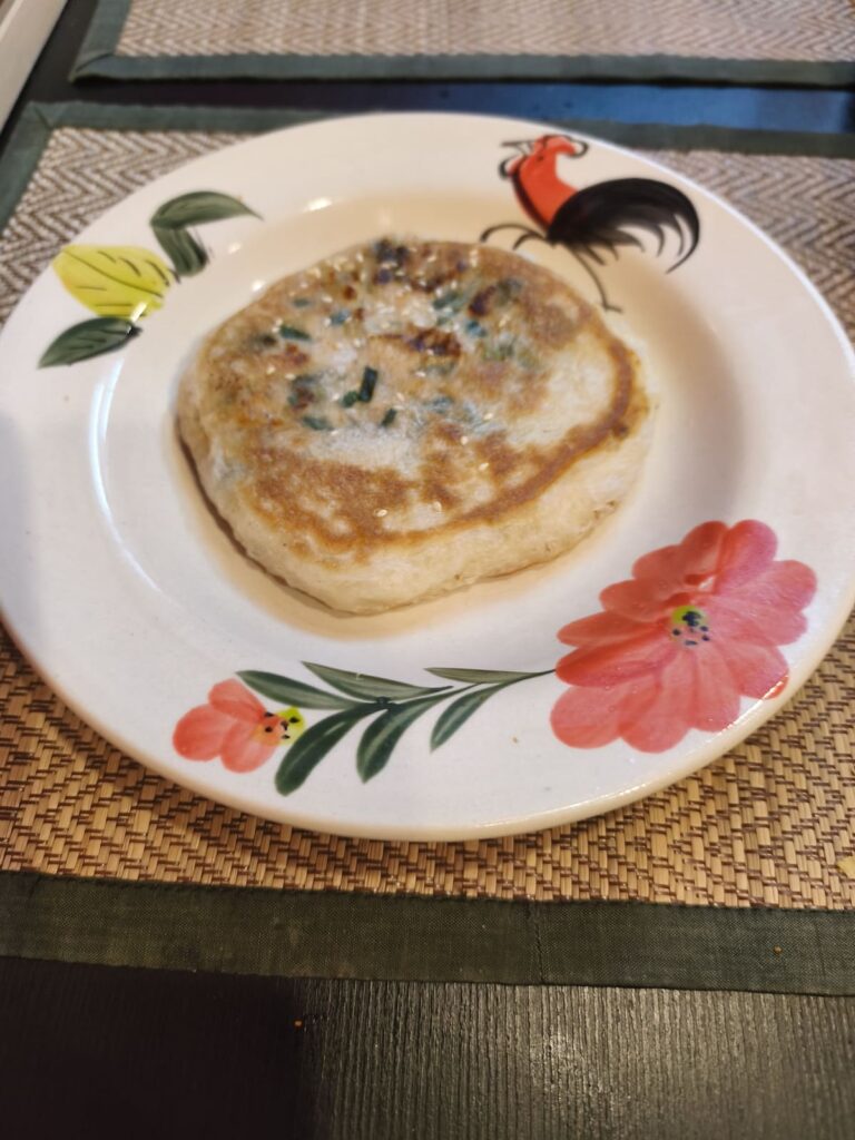 Plate with meat-filled pancake