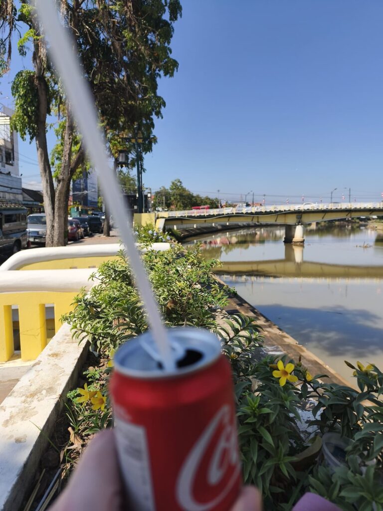 View of river and bridge from bench next to Ping