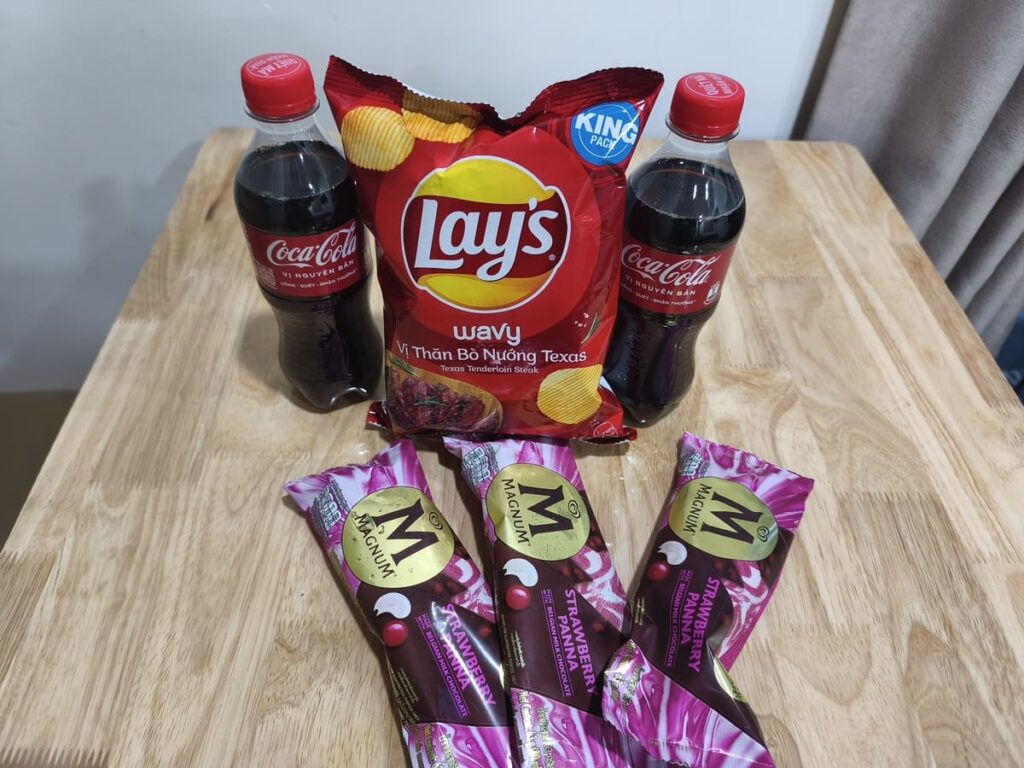 2 sodas, 3 ice cream bars, and small bag of chips