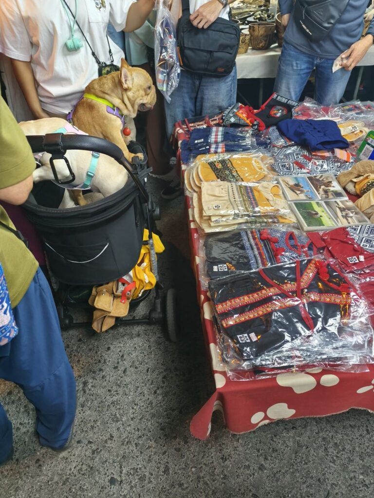 Dogs at market stall