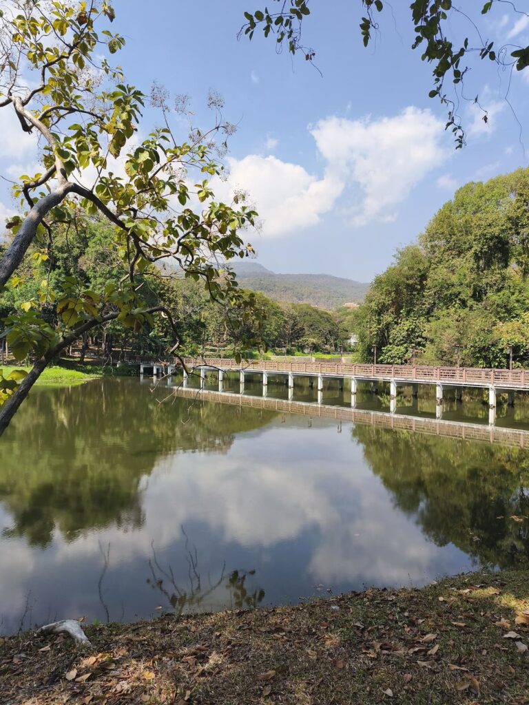 Bridge over reservoir with reflection