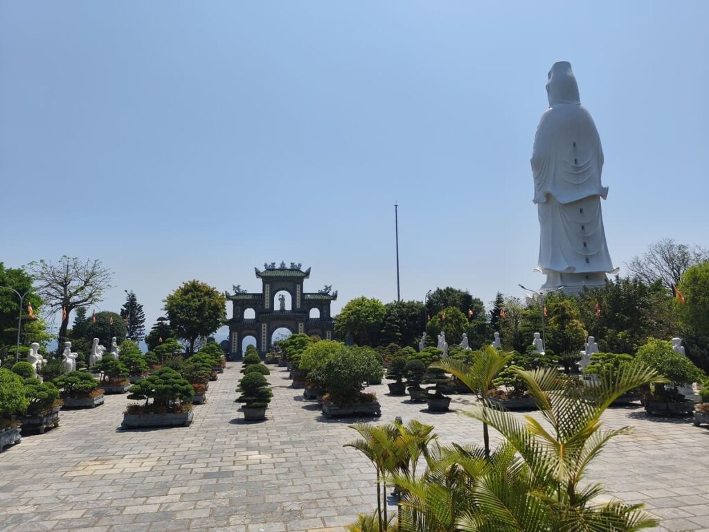 Lady Buddha statue from back