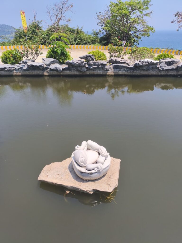 Frog statue in Pond