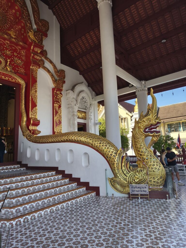 Stairs to temple with Naga statue