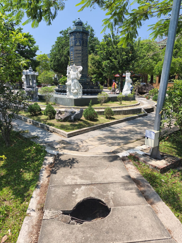 Path to monument with hole in ground