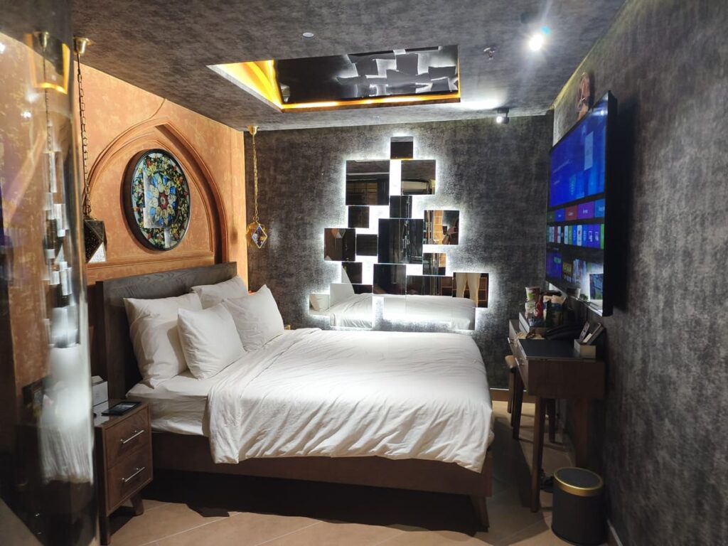 Large bed with mirrored wall