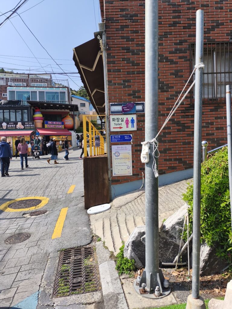 Sign for restroom at Gamcheon Village, Korea