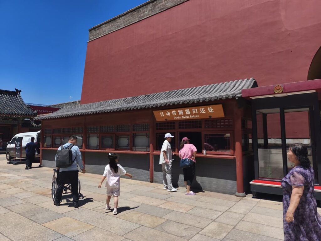Counter for returning audio guides at Palace Museum