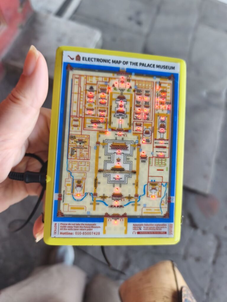 Small yellow audio guide for Forbidden City