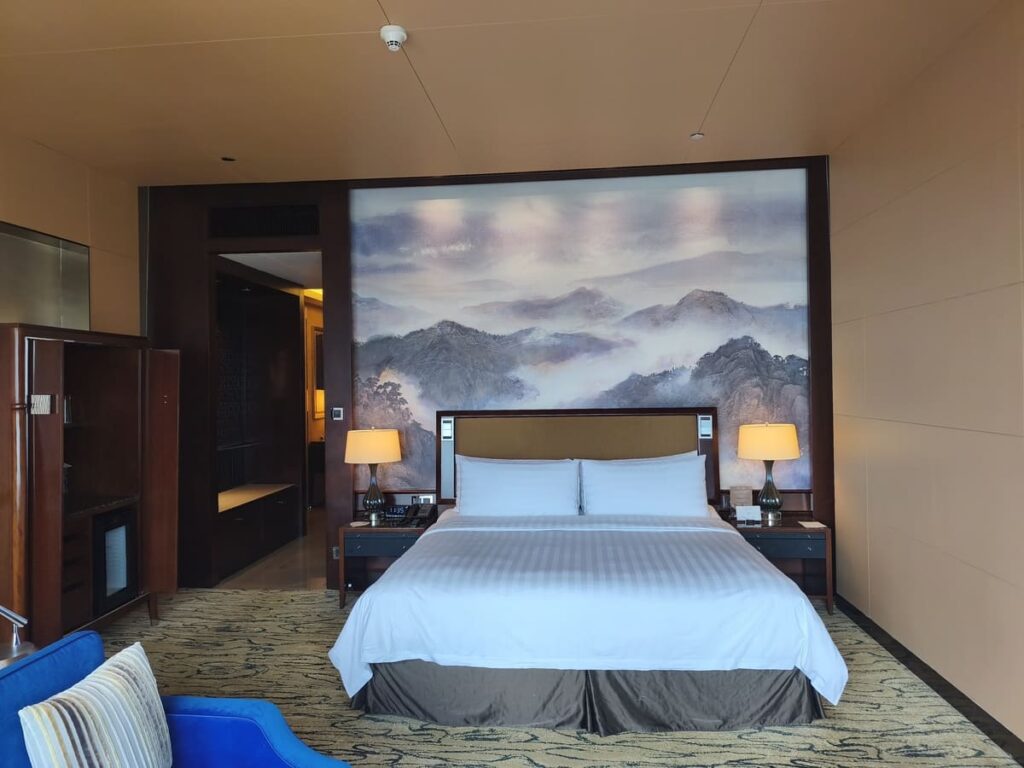 Luxurious bedroom at China Summit Wing Hotel
